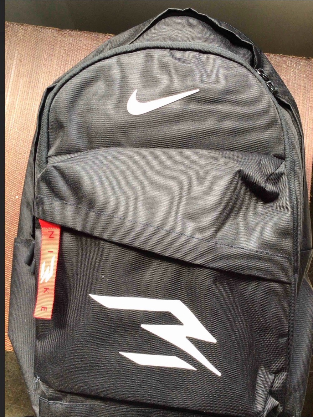 Nike Black Backpack with White Logos and Red Pull Tab